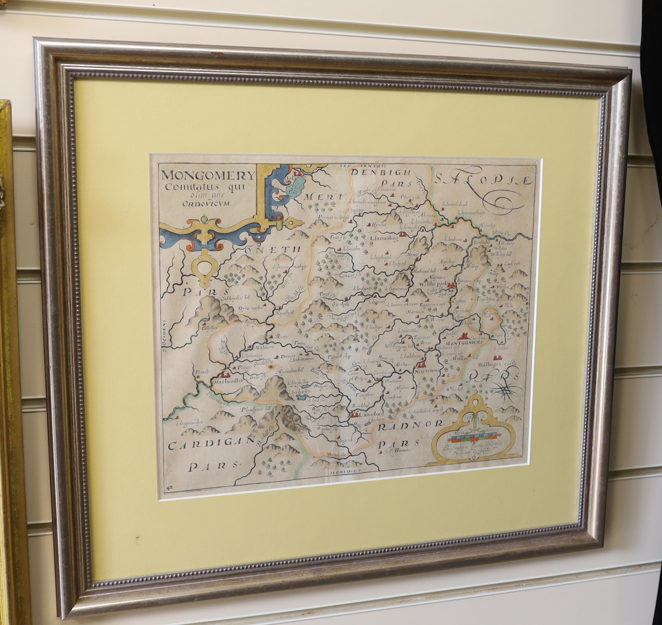 Attributed to Frances Dodd (1874-1949), pencil drawing, Portrait of an old woman, inscribed Vicagi, 26 x 25cm, and Christopher Saxton/William Kip, hand-coloured engraving, Map of Mongomery (sic), 28 x 33 cm